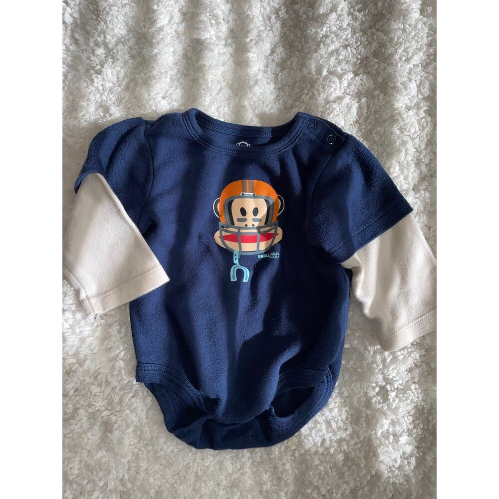 Small Paul boys sz. 6 month long sleeved striped bottom snap football top. Cute